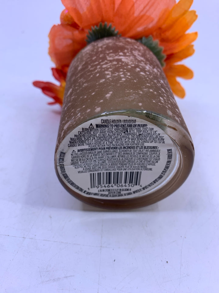SMALL ORANGE FLORAL ARRANGEMENT.