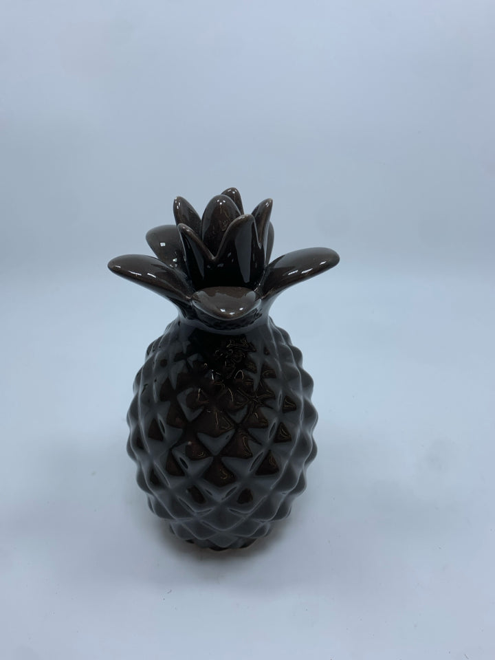 BROWN CERAMIC PINEAPPLE FIGURINE.