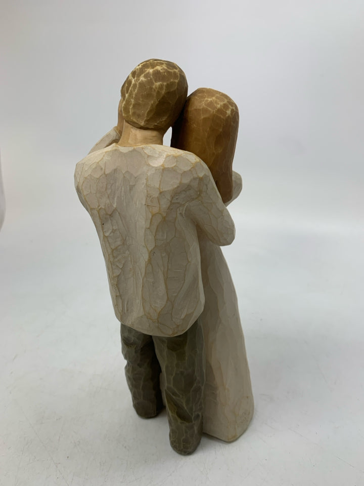 MAN/WIFE HOLDING EACHOTHER "TOGETHER".