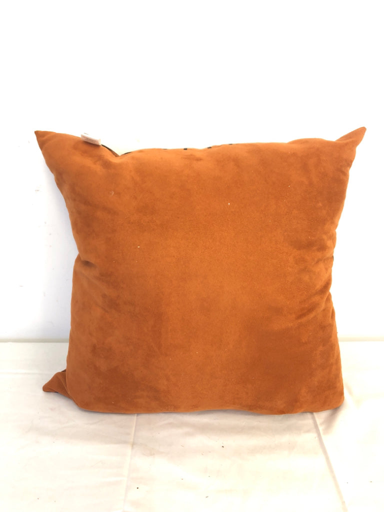 ORANGE W BLACK SCROLL PILLOW.