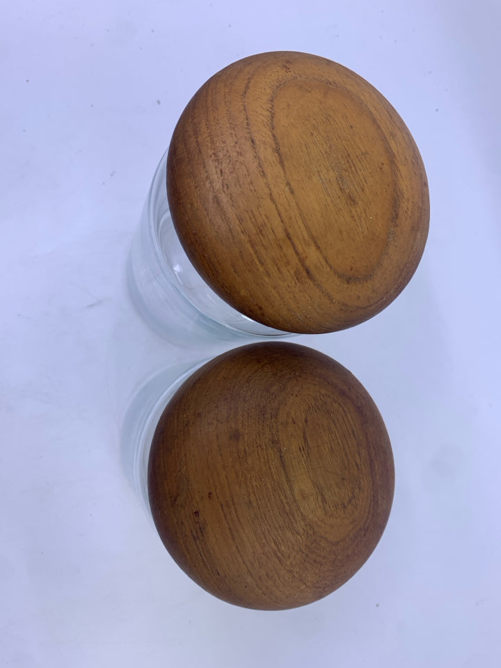 2 VTG CLEAR GLASS CANISTERS-WOOD TOPS.
