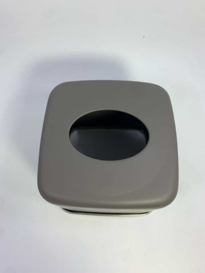GREY TISSUE BOX COVER W/SILVER RIM ON BOTTOM.
