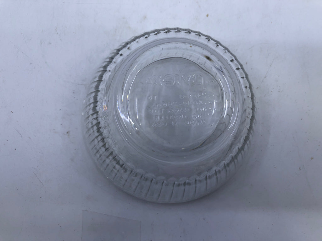 4 RIBBED PYREX BOWLS.