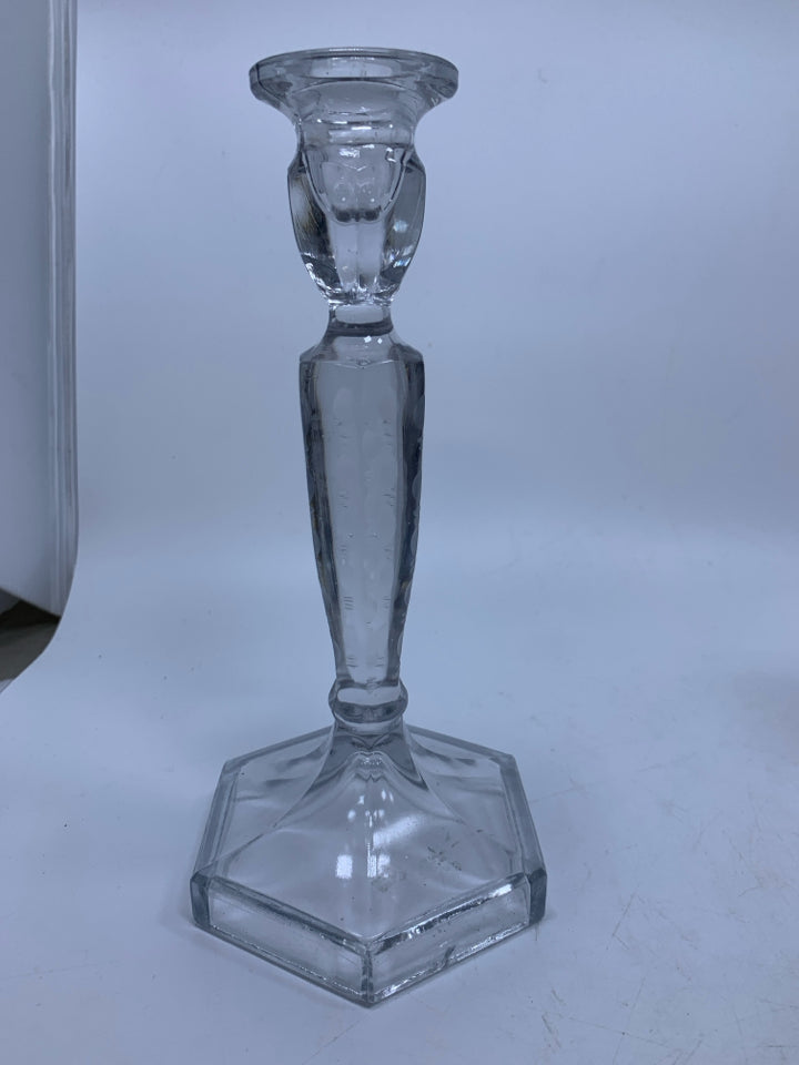 CLEAR GLASS TAPERED CANDLE HOLDER W/ HEXAGON SHAPED BOTTOM ETCHED CIRCLES.