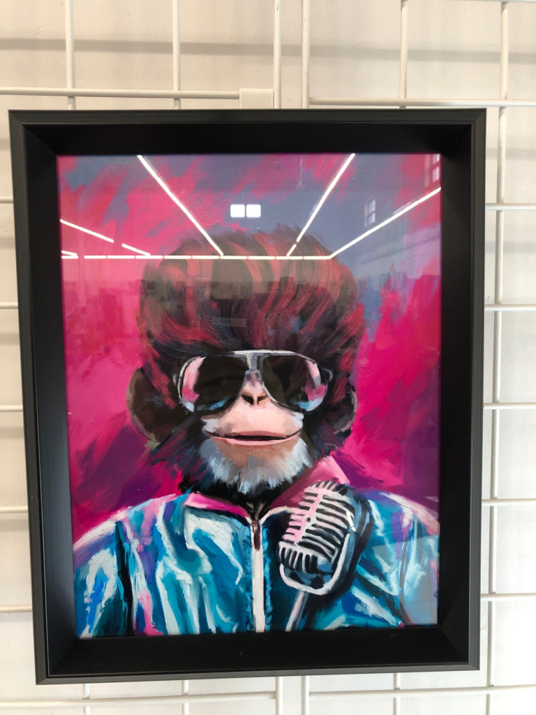 COLORFUL MONKEY IN SUNGLASSES IN BLACK FRAME.