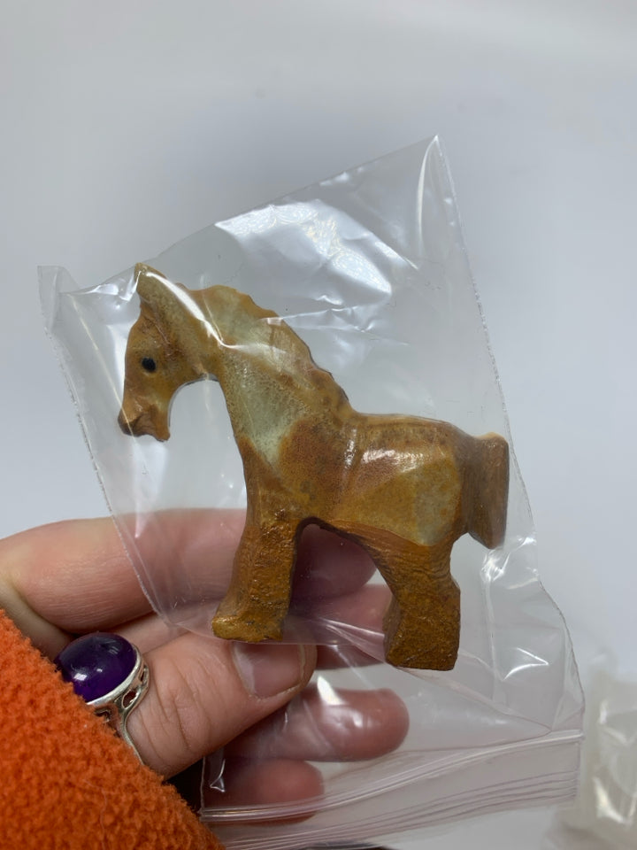 STONE CARVED HORSE IN BAG.