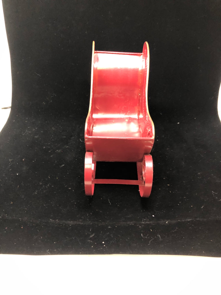 DISTRESSED RED METAL SLEIGH.