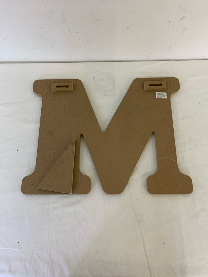 WOOD AND BLACK STANDING "M".