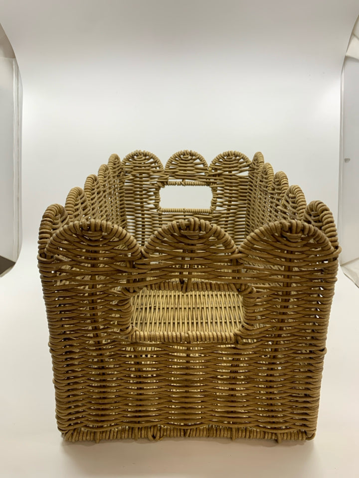 WOVEN BASKET W WAVY RIM AND HANDLES.