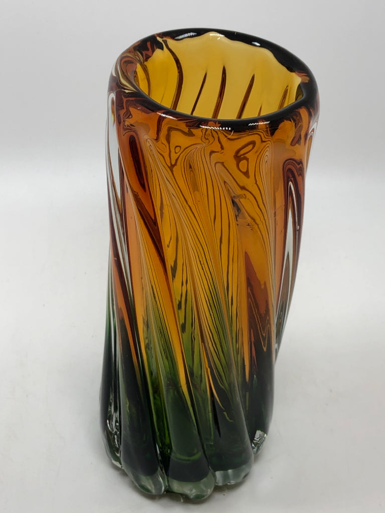 GREEN/YELLOW EASTERN GLASS SWIRL VASE.