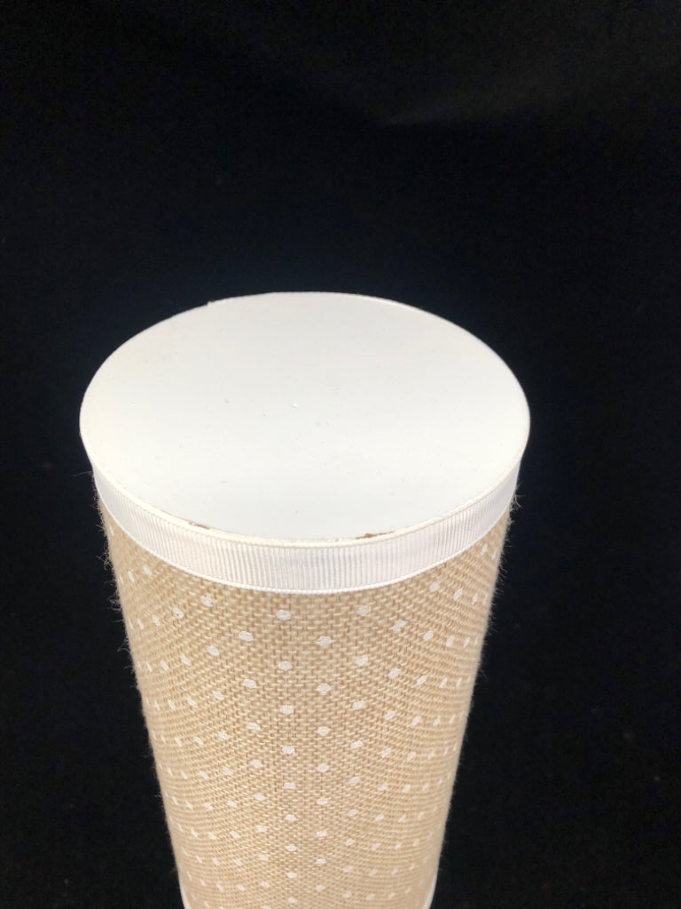 WHITE PILLAR HEADBAND STAND W/ TAN WHITE POLKA DOTS FABRIC.