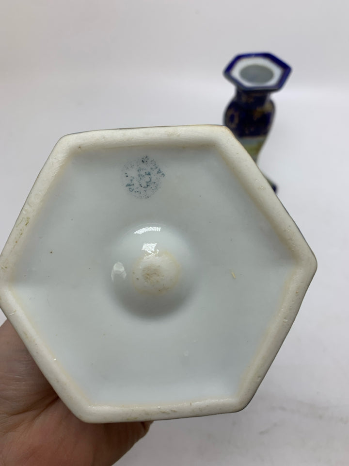 2 CERAMIC COBALT BLUE W/ SCENE TAPERED CANDLE HOLDERS.