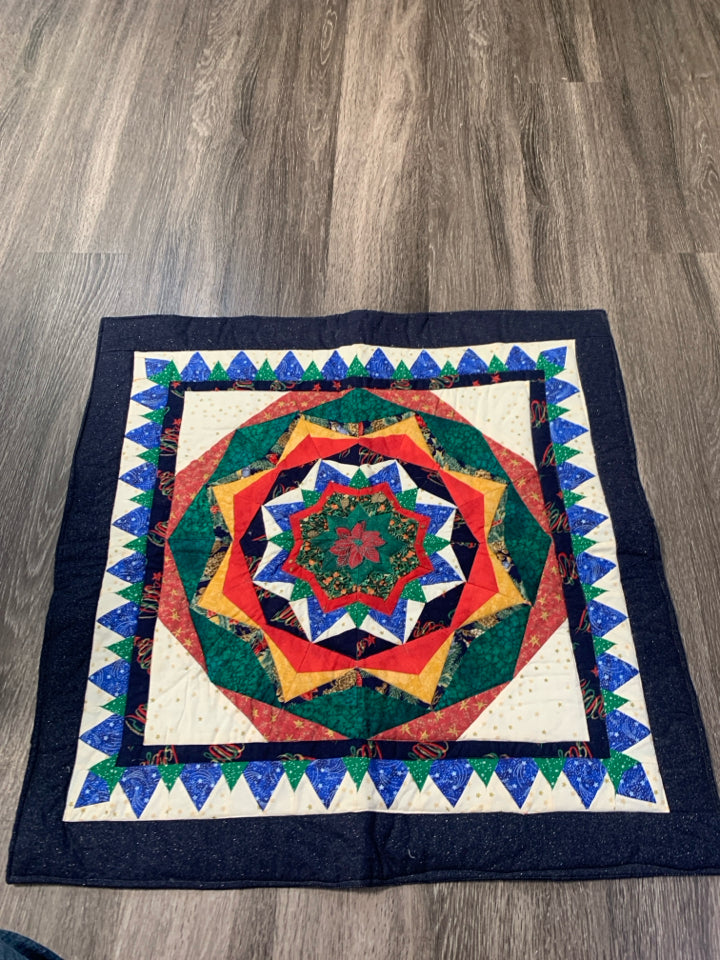 SQUARE QUILTED MULTI COLORED STAR.