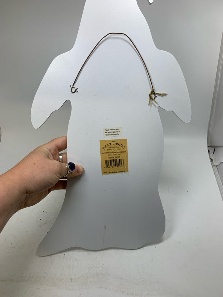 WHITE GHOST SHAPED  TIS NEAR HALLOWEEN SIGN.