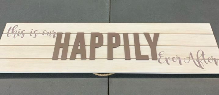 THIS IS OUR HAPPILY EVER AFTER WHITE FAUX WOOD SIGN.