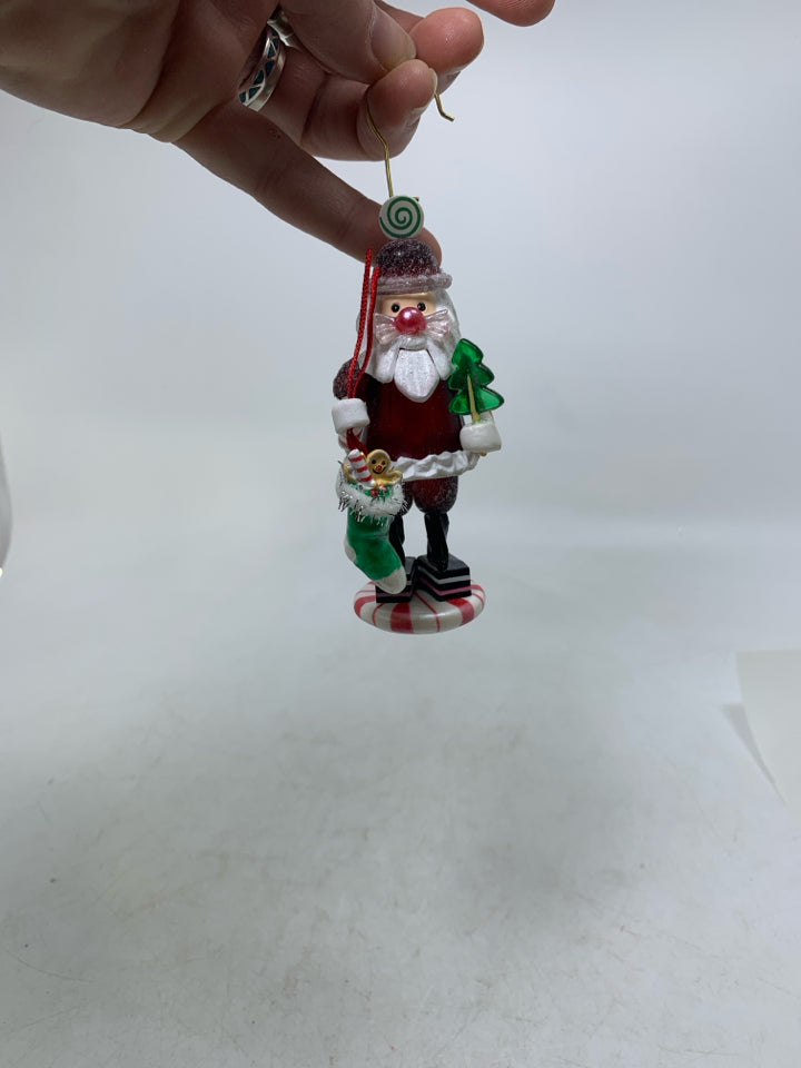 IN BOX CANDY CLAUS HALLMARK ORNAMENT.
