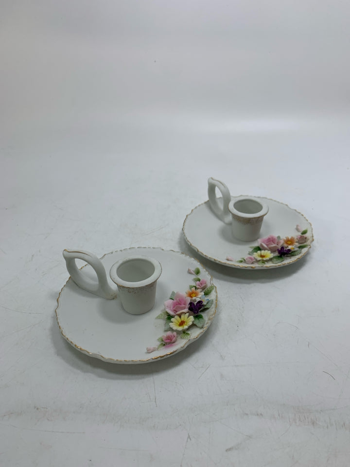 2 WHITE TAPER CANDLE HOLDERS W/ 3D ASSORTED FLOWERS GOLD DETAILS.