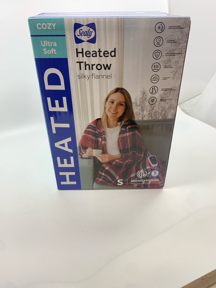 NIB HEATED THROW BLANKET.