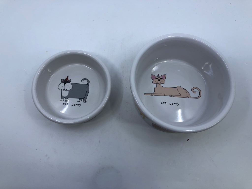 2 NESTING CAT DISHES W DIFFERENT TYPES OF CATS.