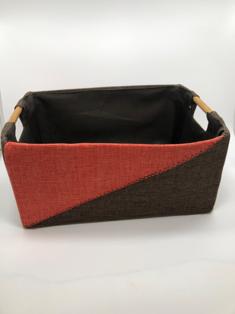 ORANGE/BROWN STORAGE BASKET W/WOOD HANDLES.