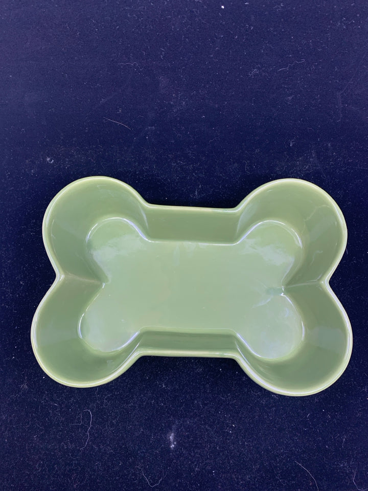 GREEN CERAMIC DOG BONE SHAPE BOWL.