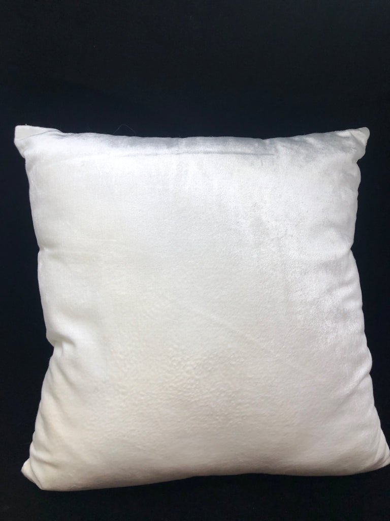 BEADED WHITE PILLOW.