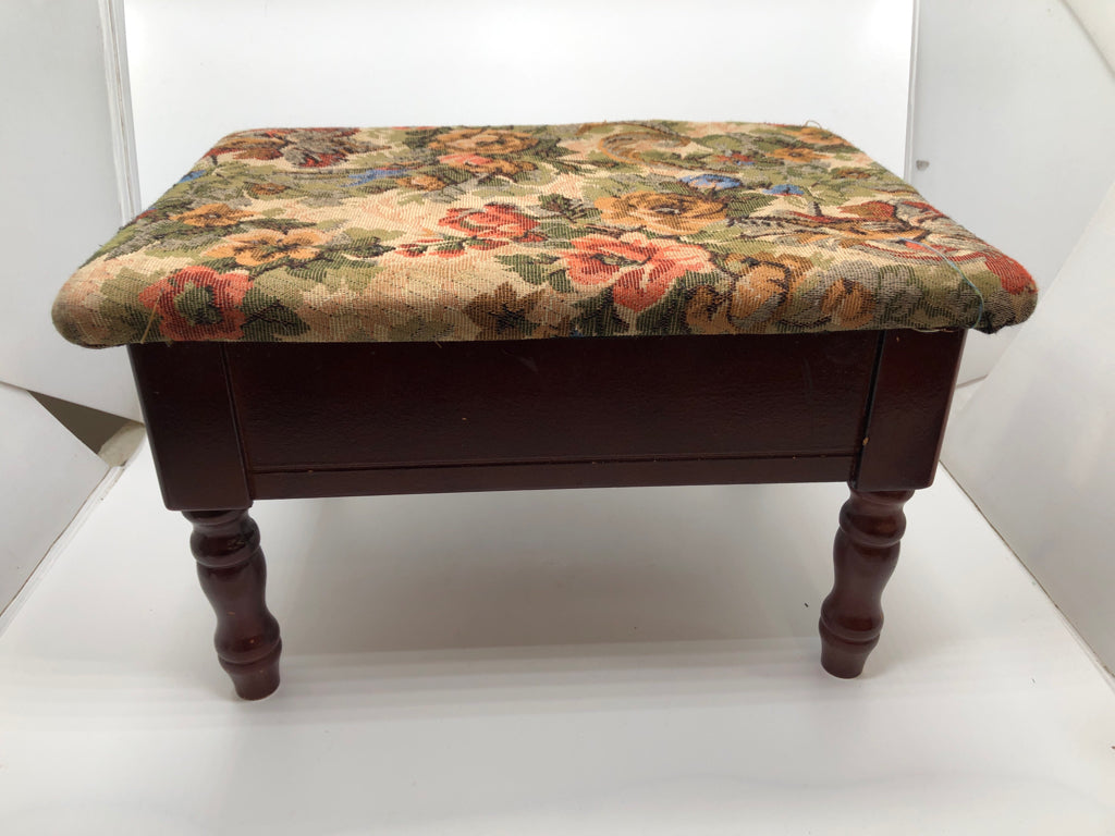VTG TAN FLORAL UPHOLSTERED STOOL W/WOOD BASE AND STORAGE.