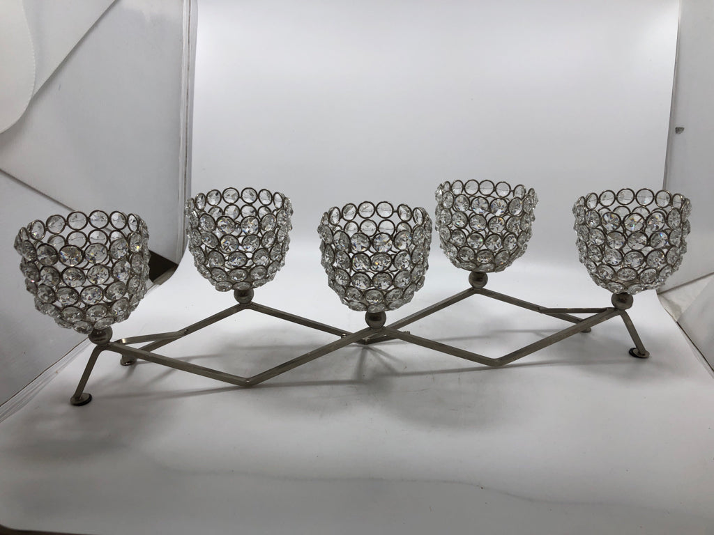 SILVER METAL AND CLEAR BEADED VOTIVE CANDLE HOLDER.