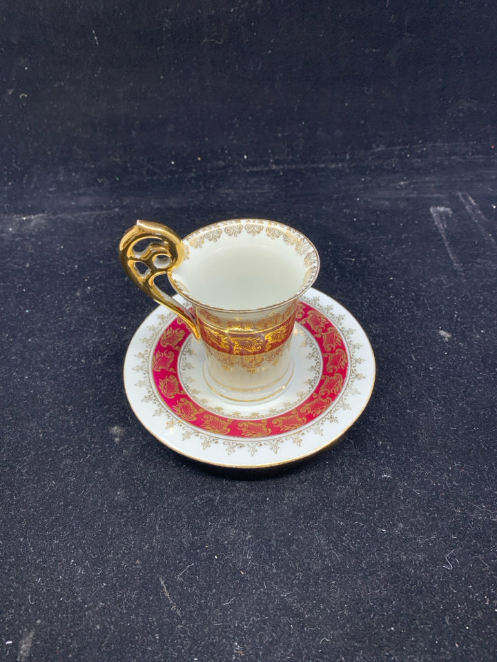 VTG DEMITASSE TEA CUP + SAUCER MAROON W/ GOLD DESIGNS.