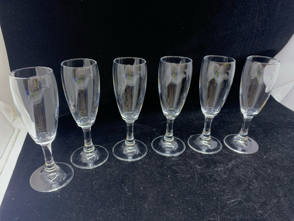 6 SMALL FOOTED CHAMPAGNE FLUTES.
