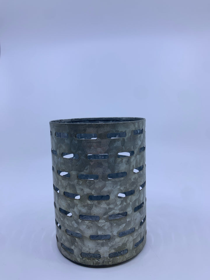 GALVANIZED METAL CANDLE HOLDER.