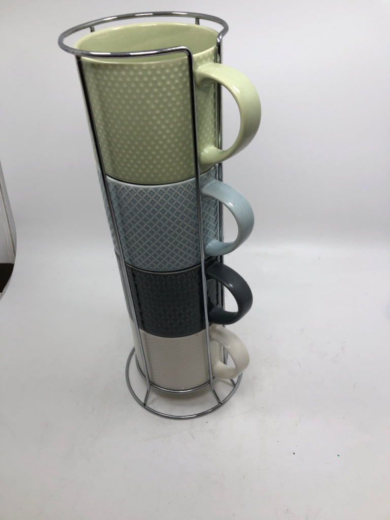 4 COOL-TONED MUGS IN STAND.
