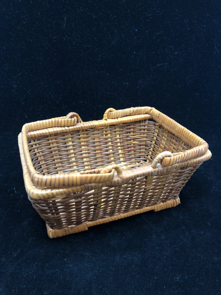 SMALL RECTANGLE BROWN WOVEN BASKET WITH HANDLES.
