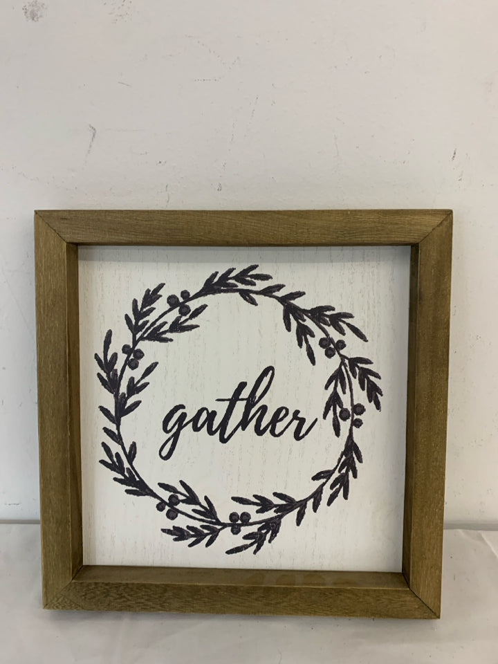 GATHER WALL HANGING IN WOOD FRAME.