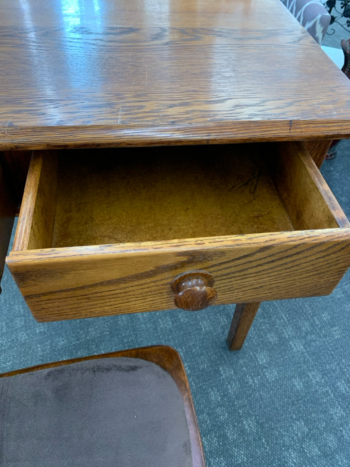 HEAVY WOOD DESK W/2 DRAWERS & CHAIR W/BROWN CUSHION.