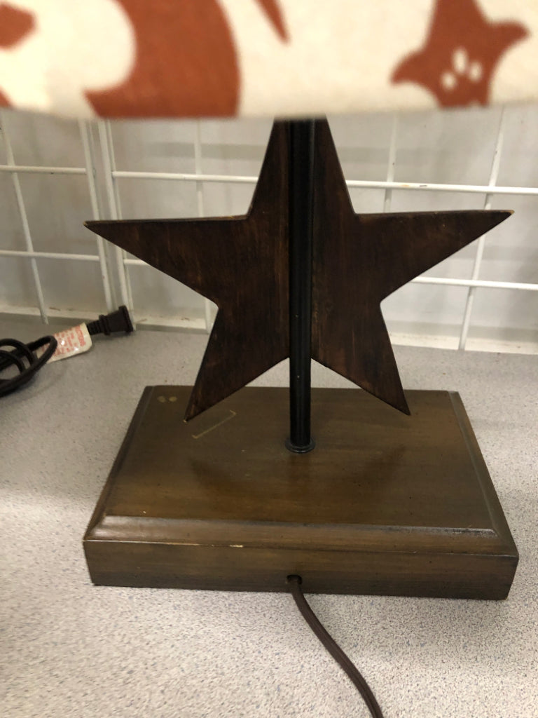 RUSTIC STAR LAMP W/ ORANGE+CREAM SHADE.