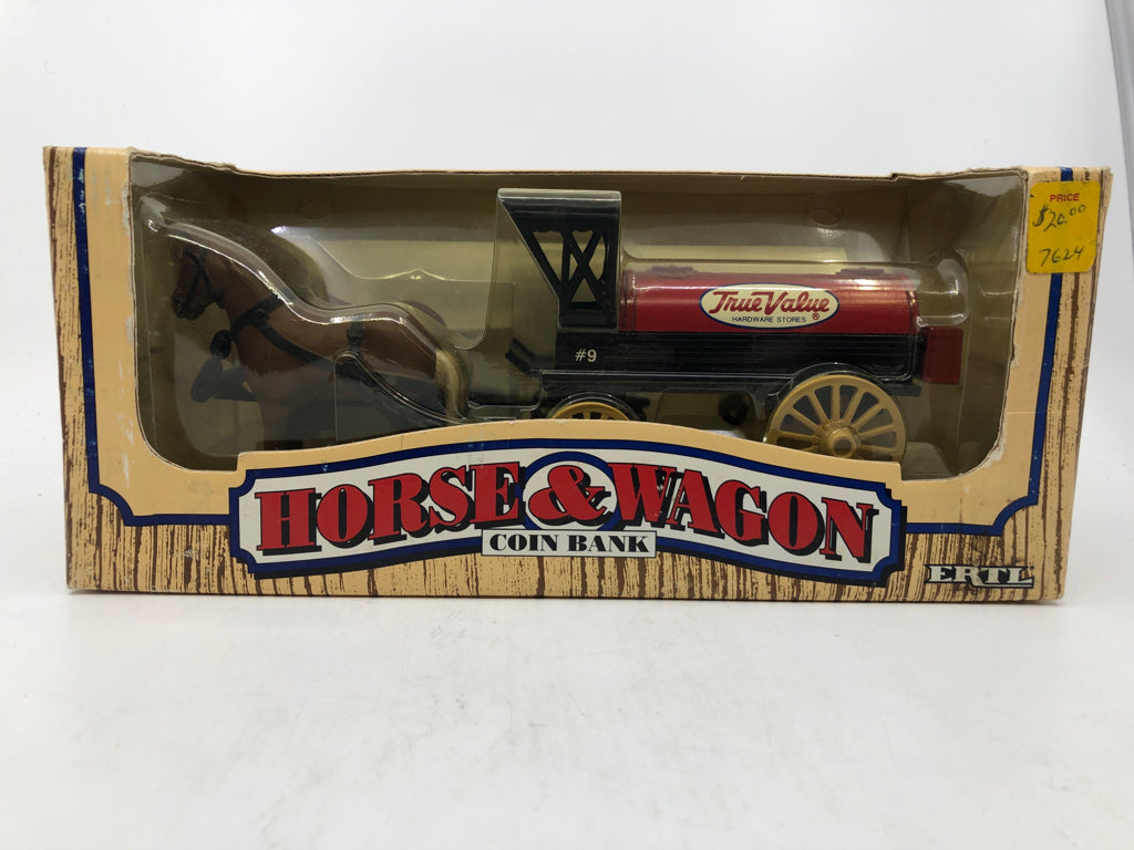 NIB TRUE VALUE HORSE AND WAGON COIN BANK.