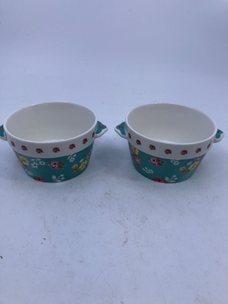 2 MINI CROCKS W/ TEAL COLORFUL FLOWERS.
