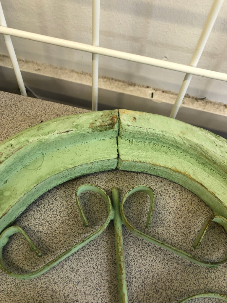 DISTRESSED GREEN PAINTED ARCH W/ METAL SCROLL WALL ART.