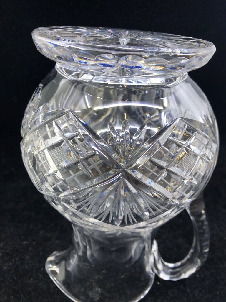 HEAVY CUT CRYSTAL FOOTED PITCHER.