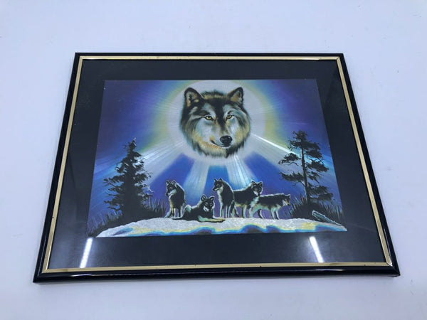 WOLVES AT NIGHT FRAMED PRINT.