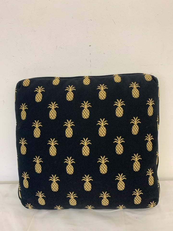 SQUARE BLACK PILLOW W/ PINEAPPLES.