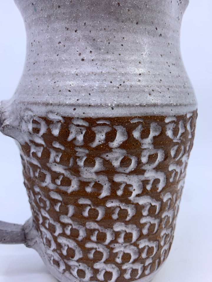 GRAY POTTERY - EMBOSSED DETAILS.