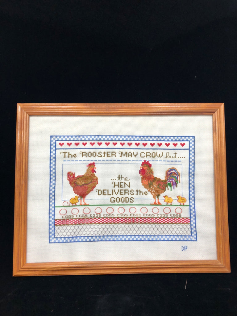 "THE ROOSTER MAY CROW BUT" CROSS STITCH IN WOOD FRAME.
