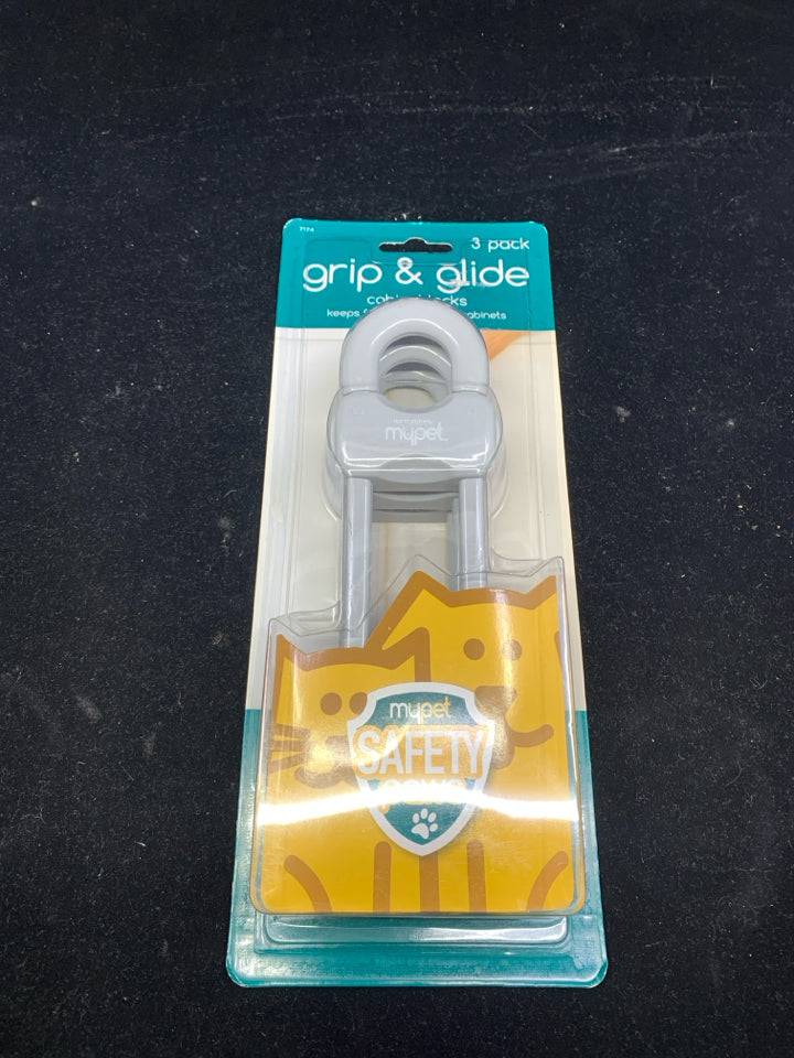 NIP GRIP AND GLIDE CABINET LOCKS.