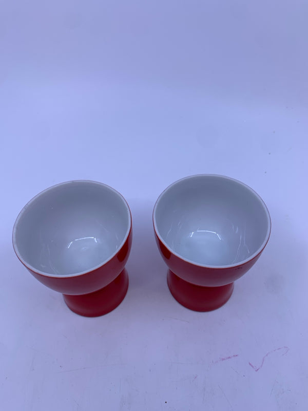 2 RED EGG CUPS.