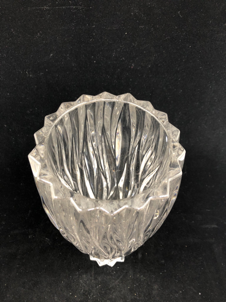 HEAVY WAVY CUT GLASS VASE.