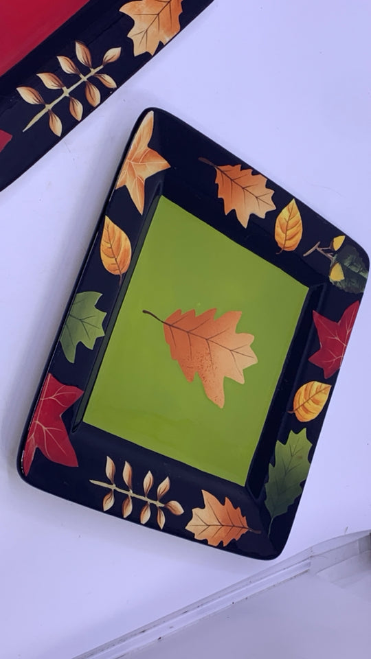 2 BLACK SQUARE LEAF PAINTED PLATES.