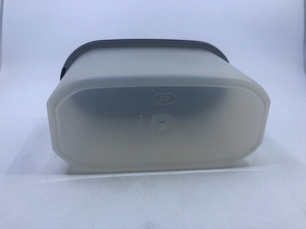 OVAL TUPPERWARE CANISTER.