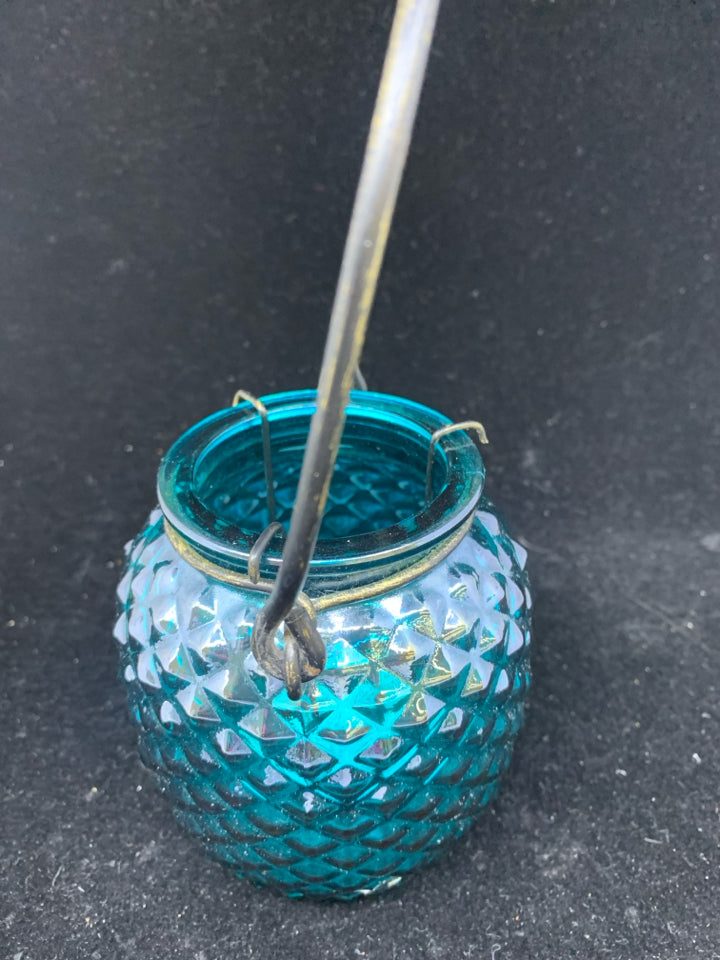 TEAL GLASS LANTERN TEA LIGHT HOLDER.